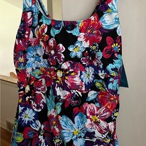 Swim suit one piece with skirt multi color flowery. Lycra.